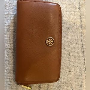 Tory Burch brown wallet used a for a couple weeks.
